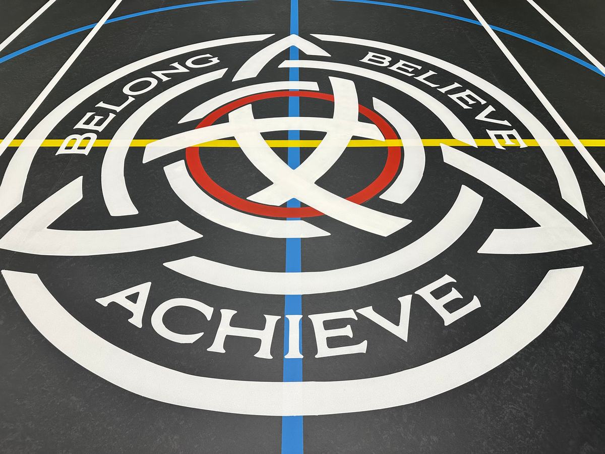 Finished school crest painted in the centre circle