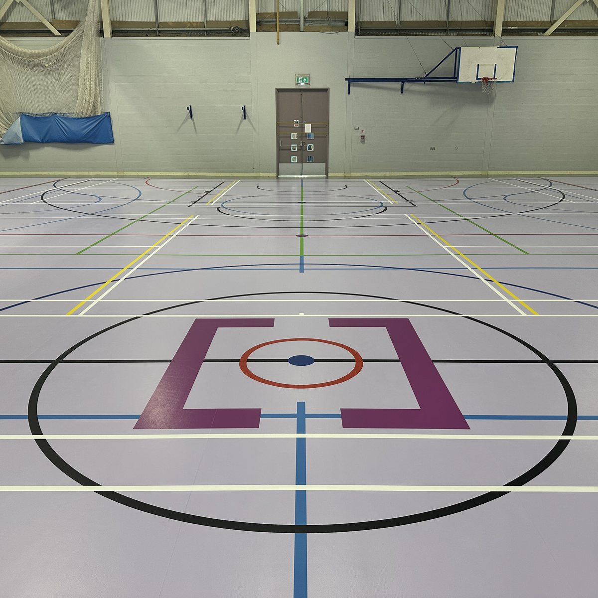 South Devon College logo painted at the centre of the new court markings